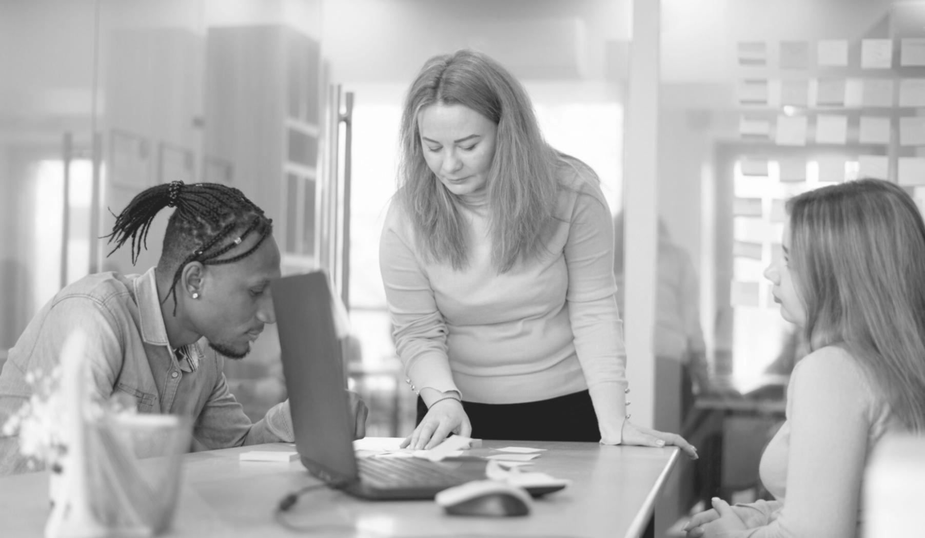 Business professional reviewing financial documents and data